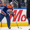 Carney skates with Oilers, told by Smith that national unity at stake