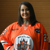 Syilx Okanagan artist’s orange jerseys foster connections at sn’pinktn hockey game